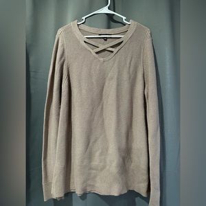 Sweater. Has a slight shimmer to the fabric. Purple, grey color